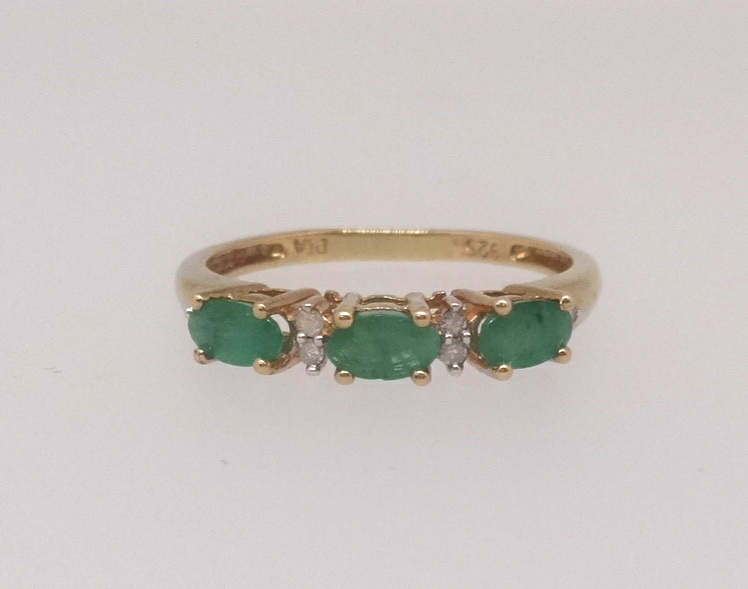 A silver gilt and greenstone dress ring, finger size P.