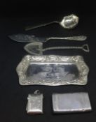 A mixed lot of silver including silver pin tray with embossed winged cherub decoration 15cm long,