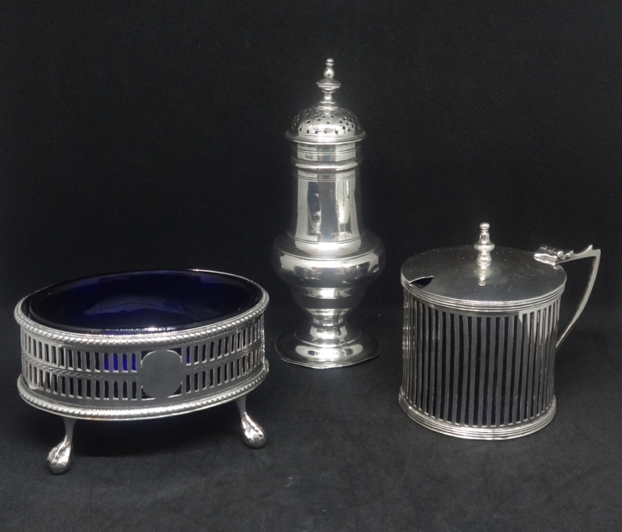 Three piece cruet set (not matched) early 20th Century including mustard pot and table salt of