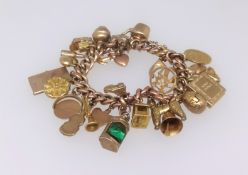 A 9ct gold charm bracelet approx. 43gms.