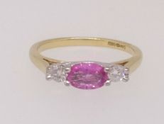 An 18ct pink sapphire and diamond ring, finger size L.