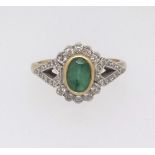 An 18ct emerald set ring, finger size M.