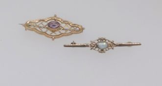 A 9ct yellow gold and opal set brooch together with another 9ct and amethyst set brooch (2)