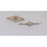 A 9ct yellow gold and opal set brooch together with another 9ct and amethyst set brooch (2)