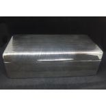 A 1930's silver rectangular cigarette box with inscription, Walker & Hall Sheffield 1928, 18cm x 9cm