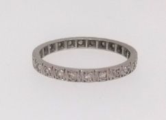 A platinum and diamond full band eternity ring approx. 2.7gms, finger size P.