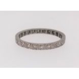 A platinum and diamond full band eternity ring approx. 2.7gms, finger size P.