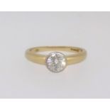 An 18ct diamond solitaire ring, approx 0.50ct, finger size L.