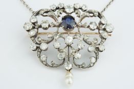 An impressive Russian diamond and sapphire set pendant come brooch with guard chain in original