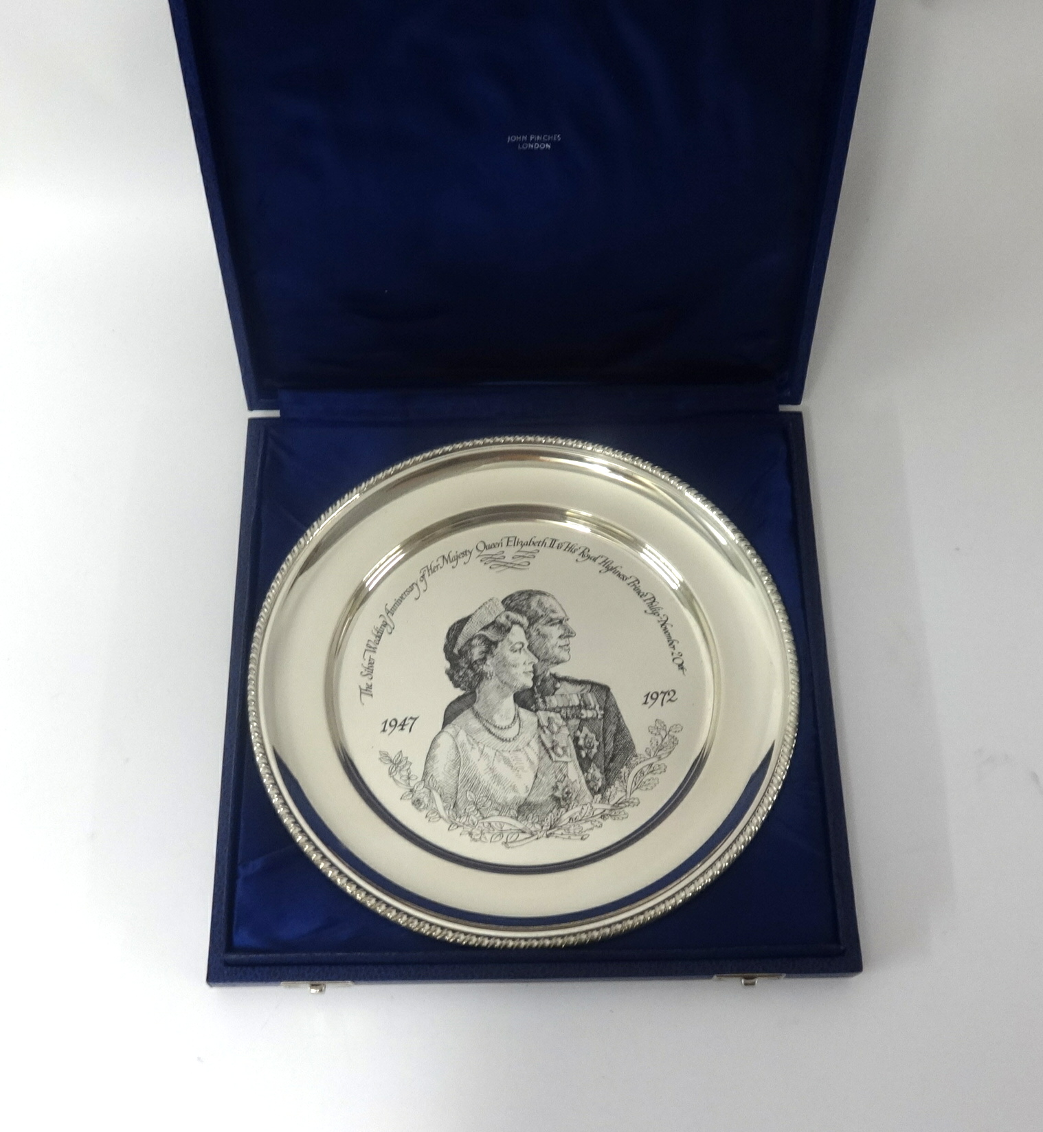 John Pinches, The Royal Anniversary plate 1947-1972, 25cm diameter, cast in sterling silver from a