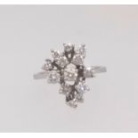 An 18ct white gold diamond fancy set ring, finger size L.