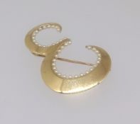 An 18ct yellow gold abstract brooch approx. 11.6gms