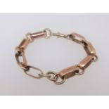 A 9ct gold open link bracelet, approx 27.9gms.