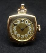 Rolex, a vintage 15ct gold wristwatch with arabic numerals and an expandable bracelet stamped