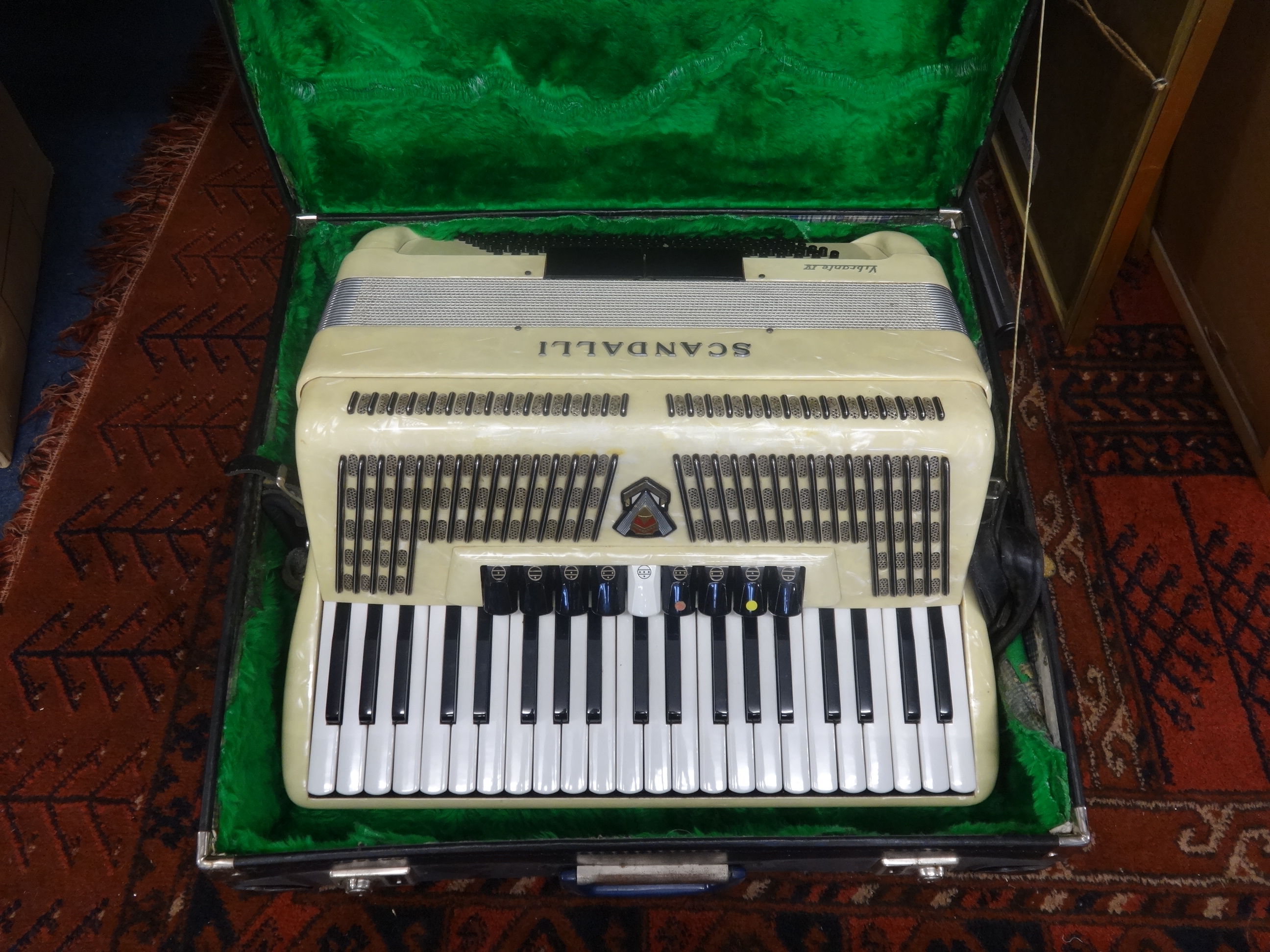 A Scandelli Vibrante IV piano accordion, cased.