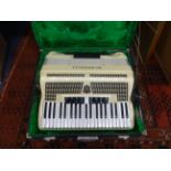 A Scandelli Vibrante IV piano accordion, cased.