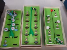 A collection of Subbuteo table soccer football teams, boxed, Subbuteo table cricket boxed,