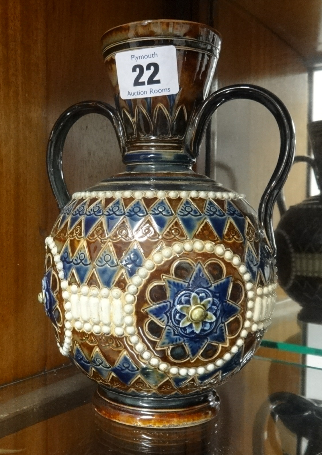 Royal Doulton Lambeth Art Pottery twin handled vase impressed 'H.V', height 20cm.