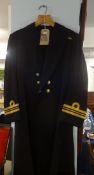 Lt Cdr Usher RN. Cocked Hat, Gold Braid Epaulettes and dress sword belts in original tin case by O &