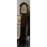 A reproduction mahogany long case clock with eight day chiming movement with key and pendulum,