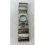 A silver fashion watch set with mother of pearl.