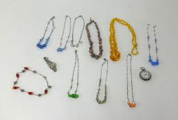 A collection of various bead necklaces, silver fob watch, a Swiss Empress Incabloc cocktail watch