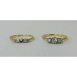 A three stone diamond set ring set in unmarked yellow metal together with another 18ct four stone