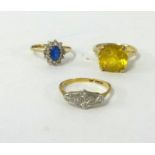 An 18ct yellow gold and platinum dress ring together with two other gem stone rings (3).