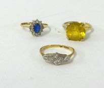 An 18ct yellow gold and platinum dress ring together with two other gem stone rings (3).