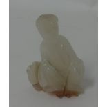 A carved jade? Buddha, approx 45mm.