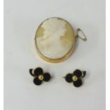 A cameo brooch set in yellow metal together with a pair of 14ct and black onyx leaf design