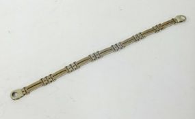 A 9ct gold contemporary styled bracelet, approx 17gms.