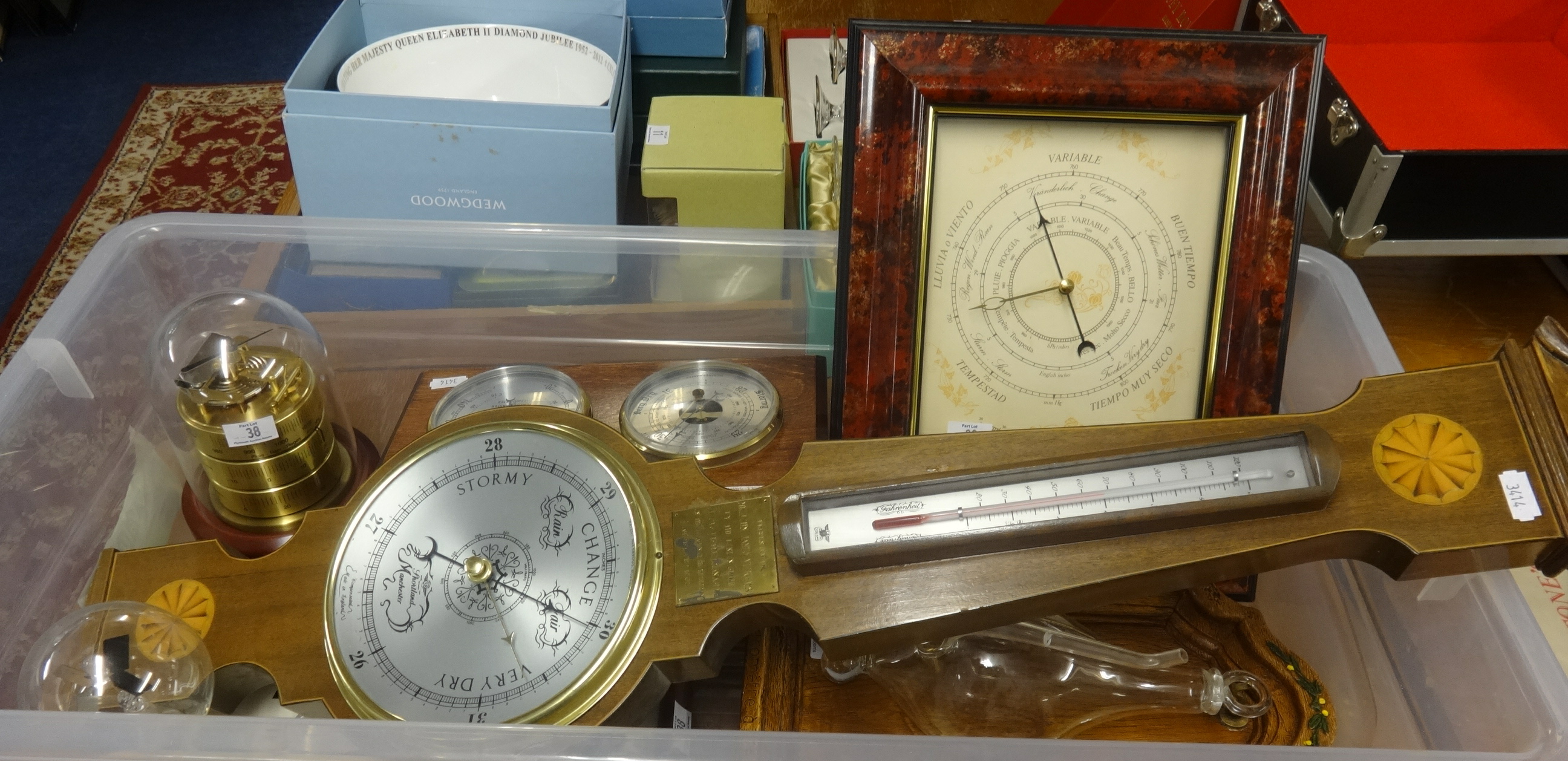 A reproduction mahogany cased barometer by Shortland of Manchester together with various other