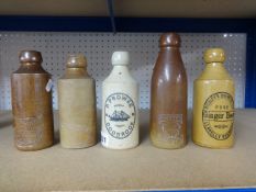 Nine old ginger beer bottles including South Hams Mineral Water Company, Harbourne Home Brewers,