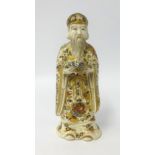 A Chinese porcelain figure of a man with long beard, g