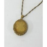 A 9ct gold locket and fine 9ct chain.