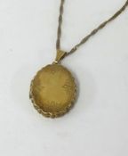 A 9ct gold locket and fine 9ct chain.