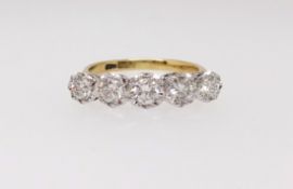 An 18ct antique five stone diamond ring, finger size R.