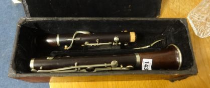 A rosewood cased clarinet, boxed.