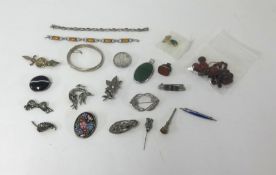 A bag of mixed jewellery and objects including arts and crafts style brooch, silver bangle and