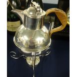 A stylish silver plated picnic kettle on stand with spirit burner.
