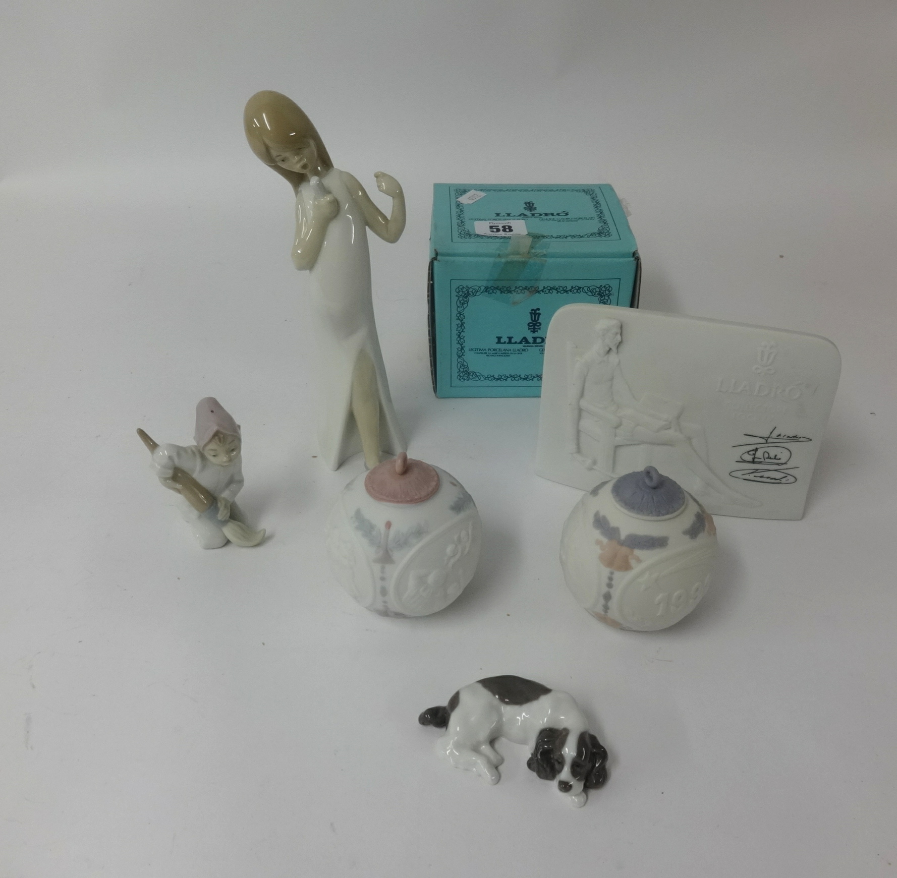 Lladro, 1988 Christmas bell, two Lladro baubles, figures and plaque (7), one boxed.
