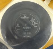 A collection of Beatles 45 rpm single records.