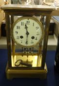 An antique four glass clock with eight day movement, the pendulum with mercury tubes, bell strike