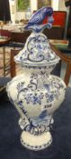 A 20th century Dutch style blue and white vase and cover.
