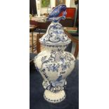 A 20th century Dutch style blue and white vase and cover.