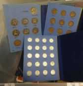 A quantity of various general coins including commemorative crowns, GB sets in blue folders, decimal