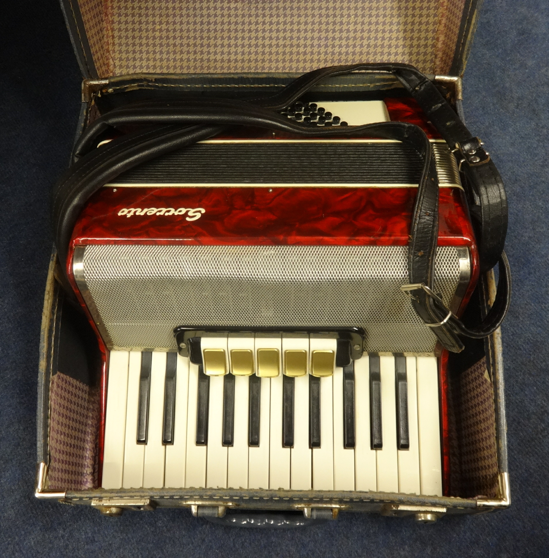 A Sorrento piano accordion, cased.