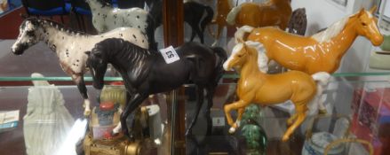 Four Beswick horses. .