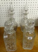 Two pairs of glass decanters (4).